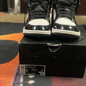 Jordan Women’s  Black and White High-Top Sneakers